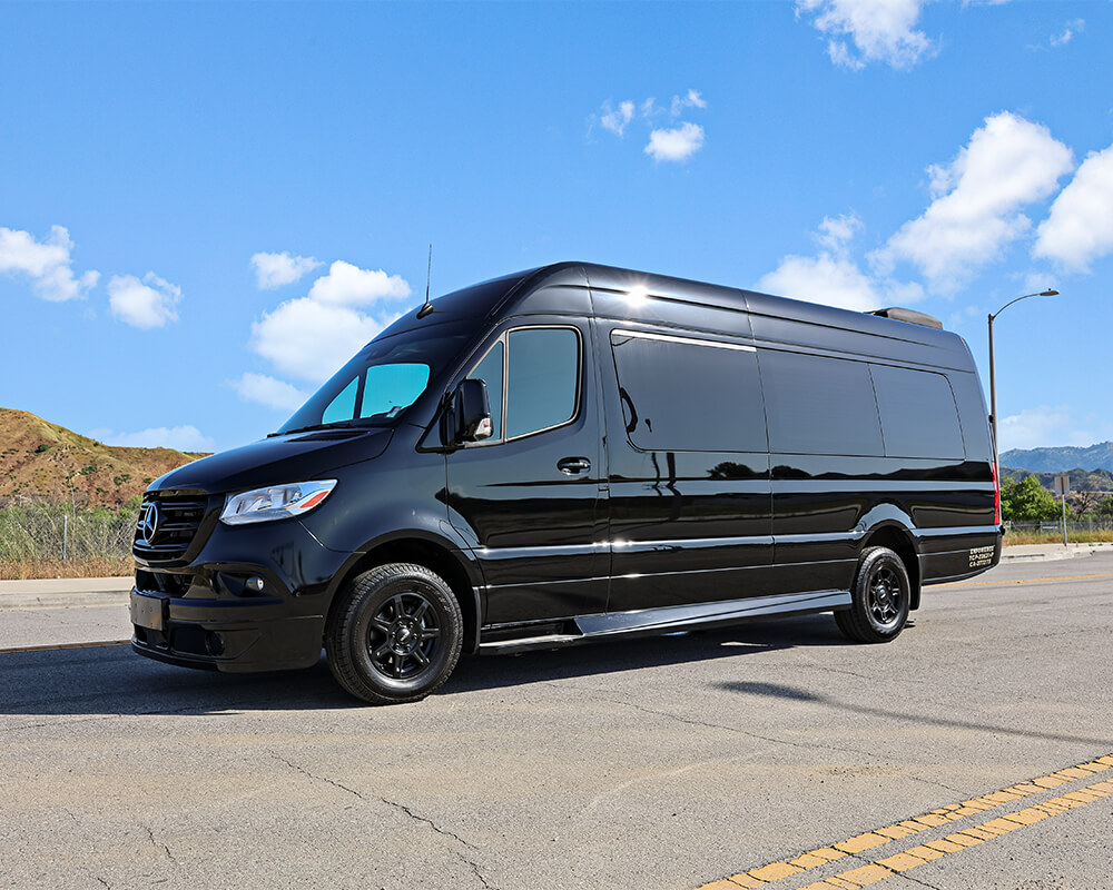 Black Mercedes-Benz Sprinter 3500 limo parked on the road in daylight